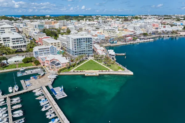 A triangular park in Hamilton harbour next to a marina