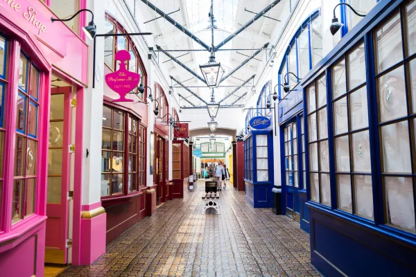 Patrons explore colourful shops inside Clock Tower Mall in the dockyard of Bermuda