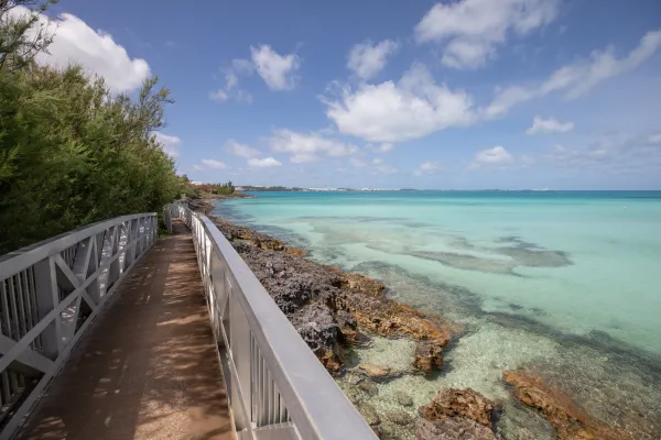 A boardwalk running alongside the ocean