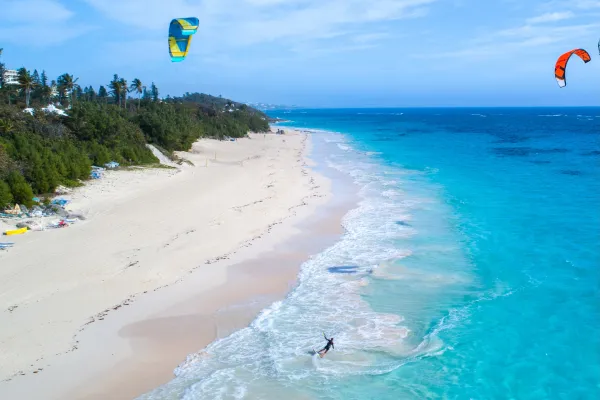 People kite surfing on a Bermuda beach