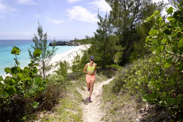 Flora Duffy running on a trail