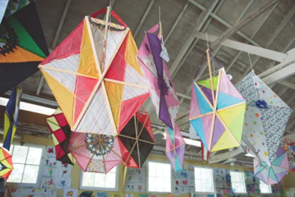 Kites hanging from the rafters 
