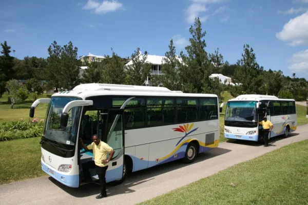 Buses with drivers outside