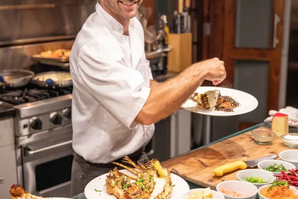 A chef is tabling food.