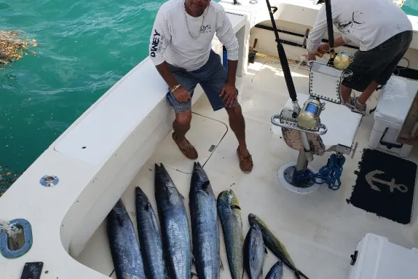 Atlantic Spray Charters – Captain With Fish