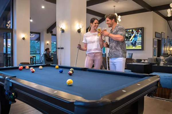 Boundary Sports Bar and Grille – Couple Playing Pool At Boundary