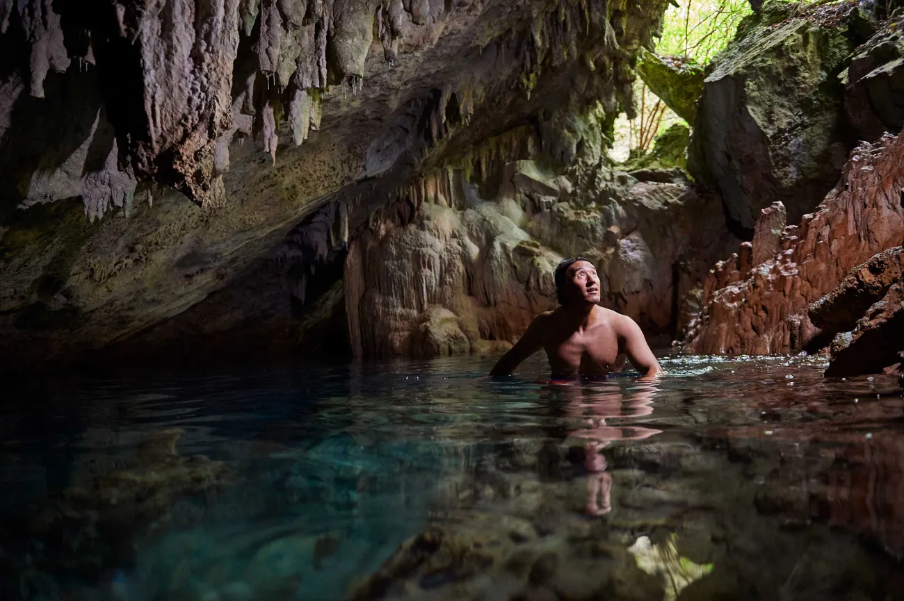 man in a beautiful cave