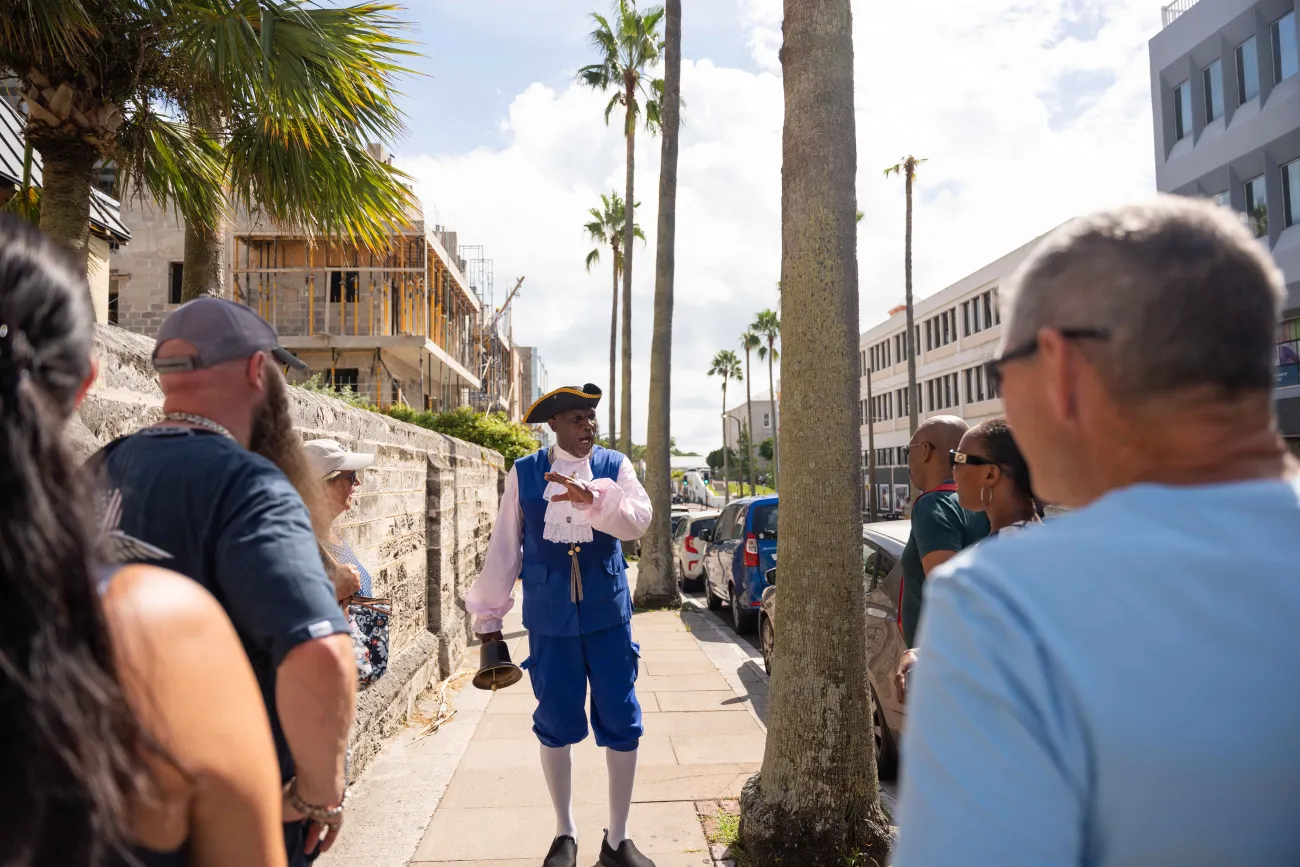 Town crier giving a tour of town.