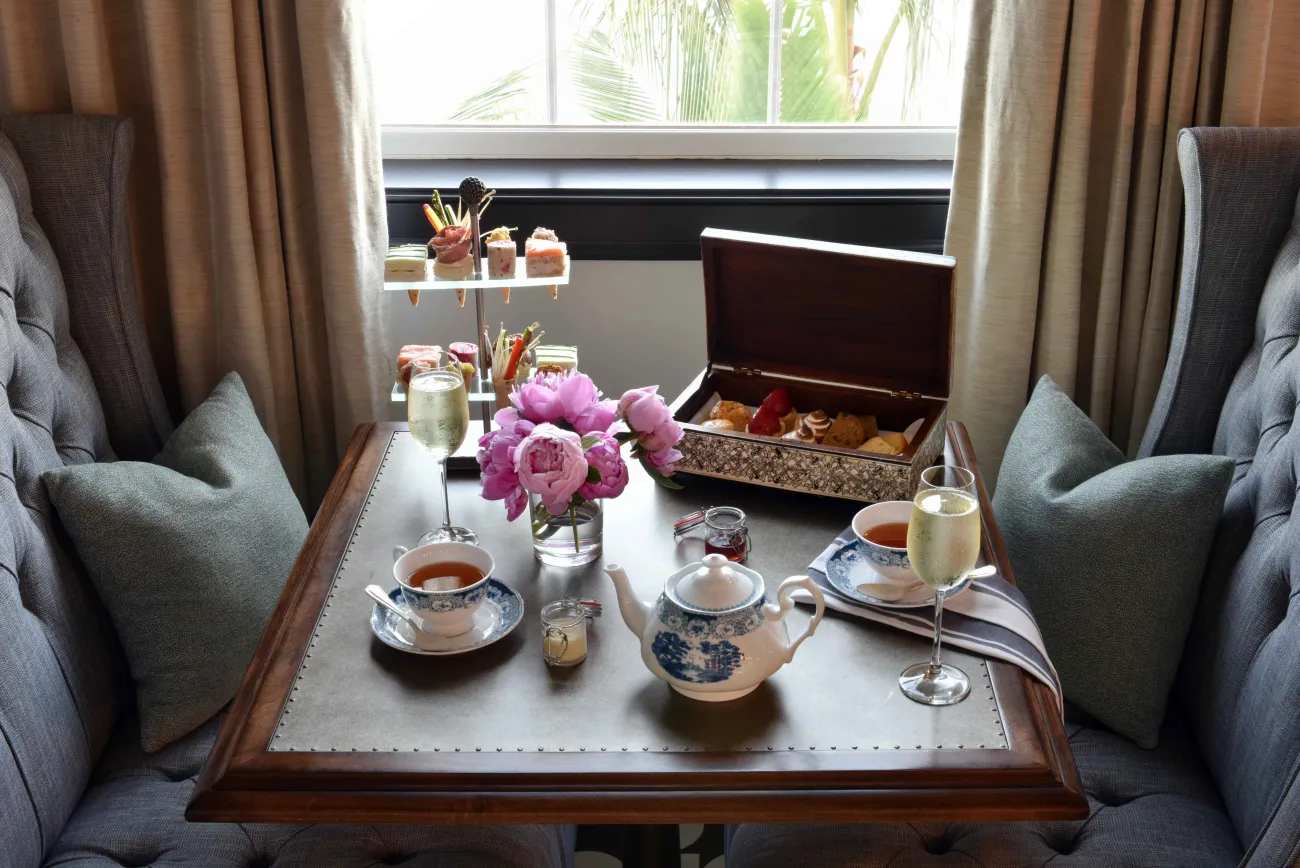 A table filled with afternoon tea items. 