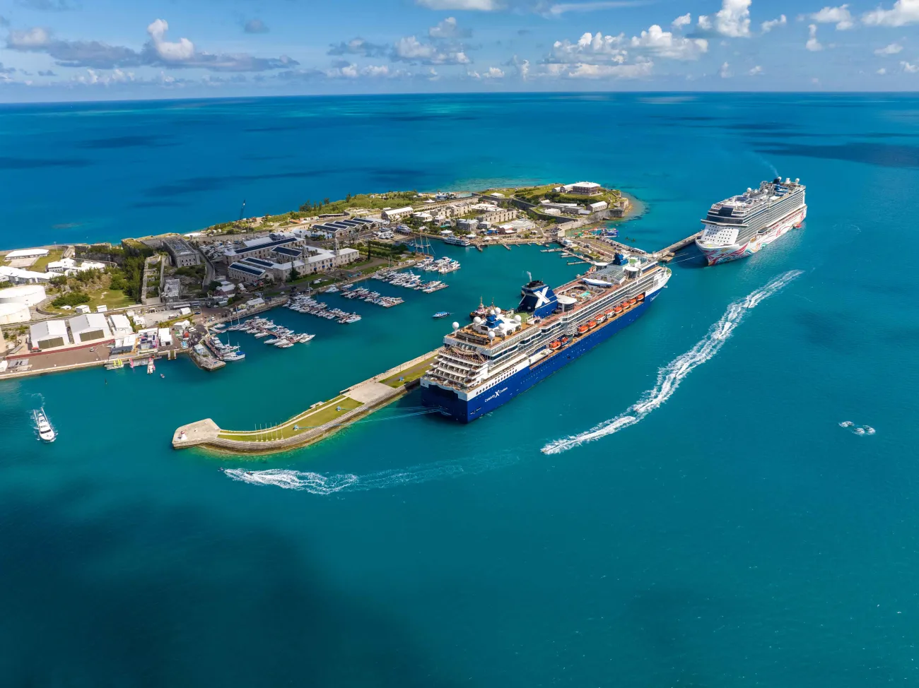 Aerial of cruise ships docked in Dockyard.