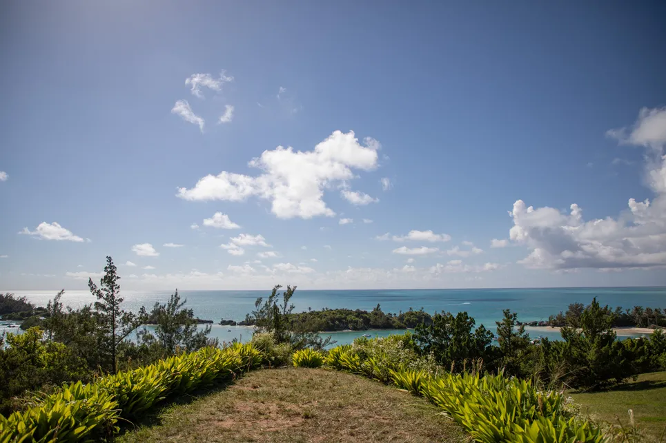A wide angle from Fort Scaur with an ocean and beach view.