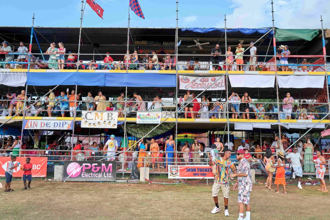 People are standing at colorful camps during Bermuda Cup Match.