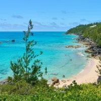 The view of a cove beach from a hillside in Bermuda